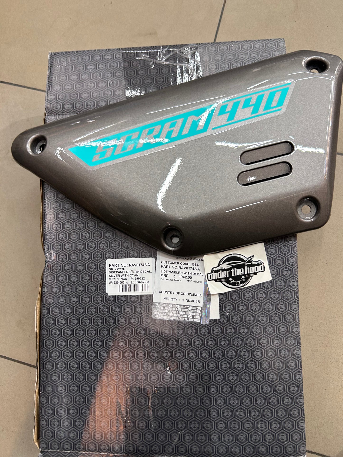 Royal Enfield RAV01742/A - Side Panel RH with Decal - SILVER WITH CYAN for Scram 440 - OEM