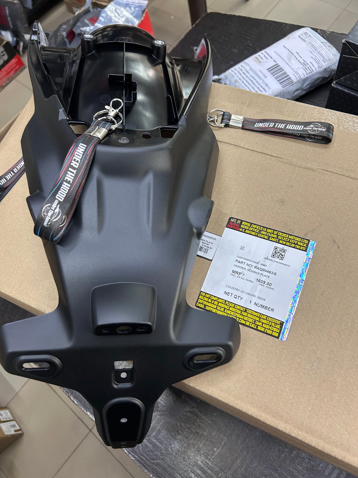 RAQ00493 Royal Enfield – Hanger, Number Plate for Himalayan 450 (Rear Number Plate Bracket) | Genuine OEM