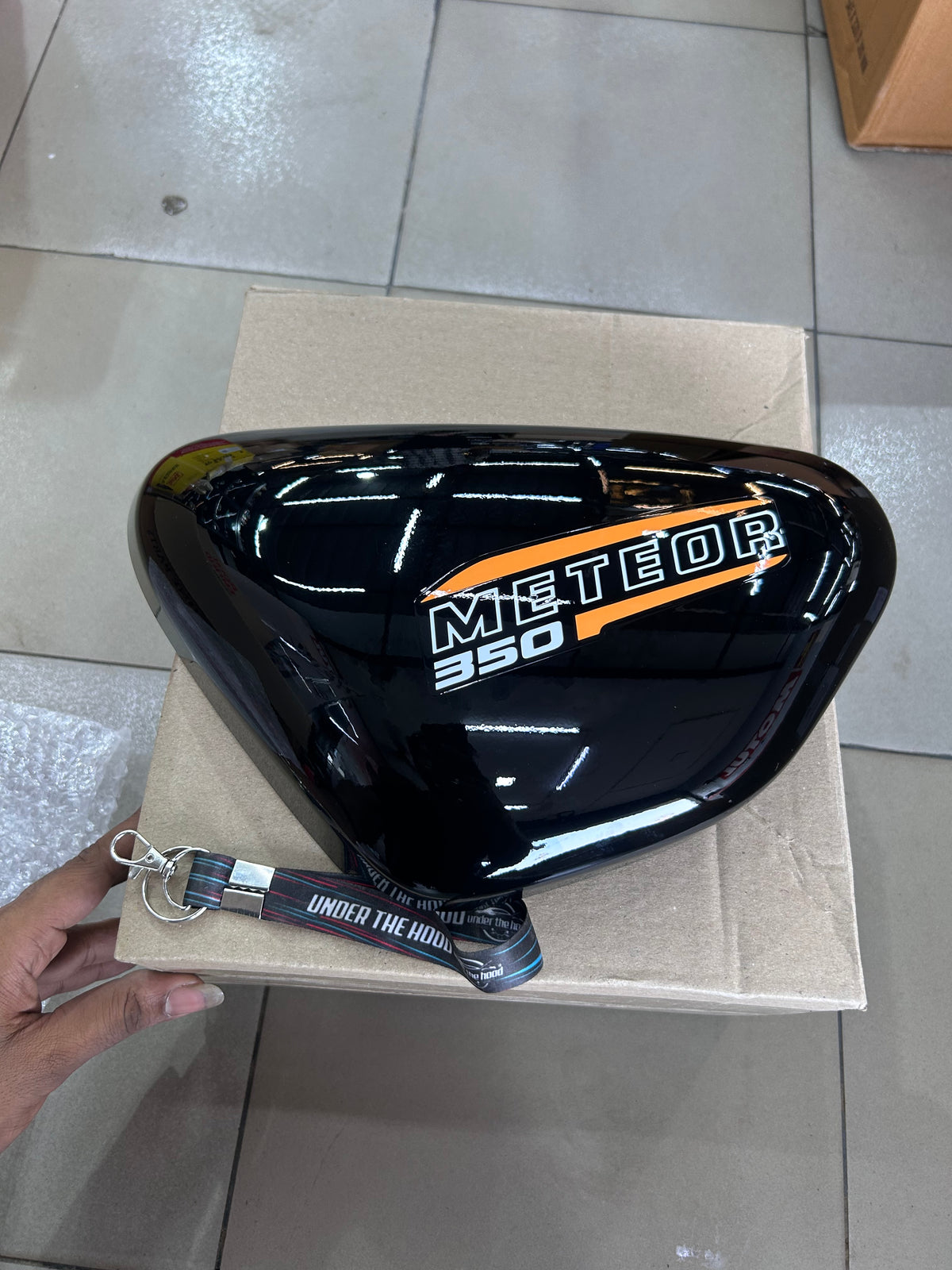 Royal Enfield Meteor 350 Fireball Orange LH Outer Cover with Orange Sticker Gloss Black RAV02804/A