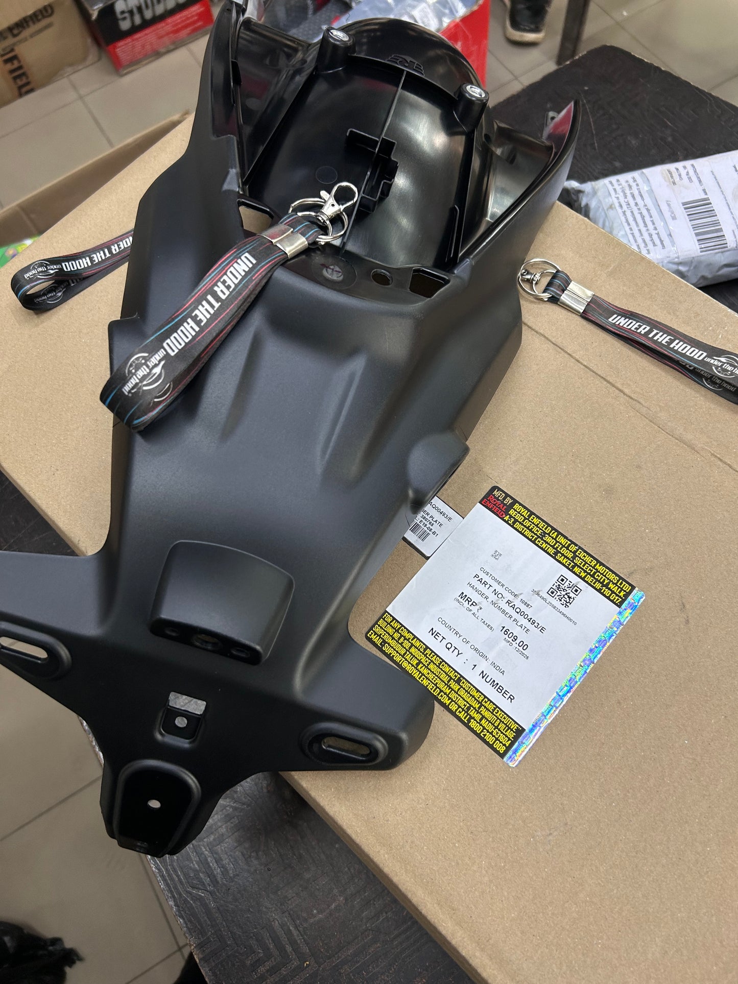 RAQ00493 Royal Enfield – Hanger, Number Plate for Himalayan 450 (Rear Number Plate Bracket) | Genuine OEM