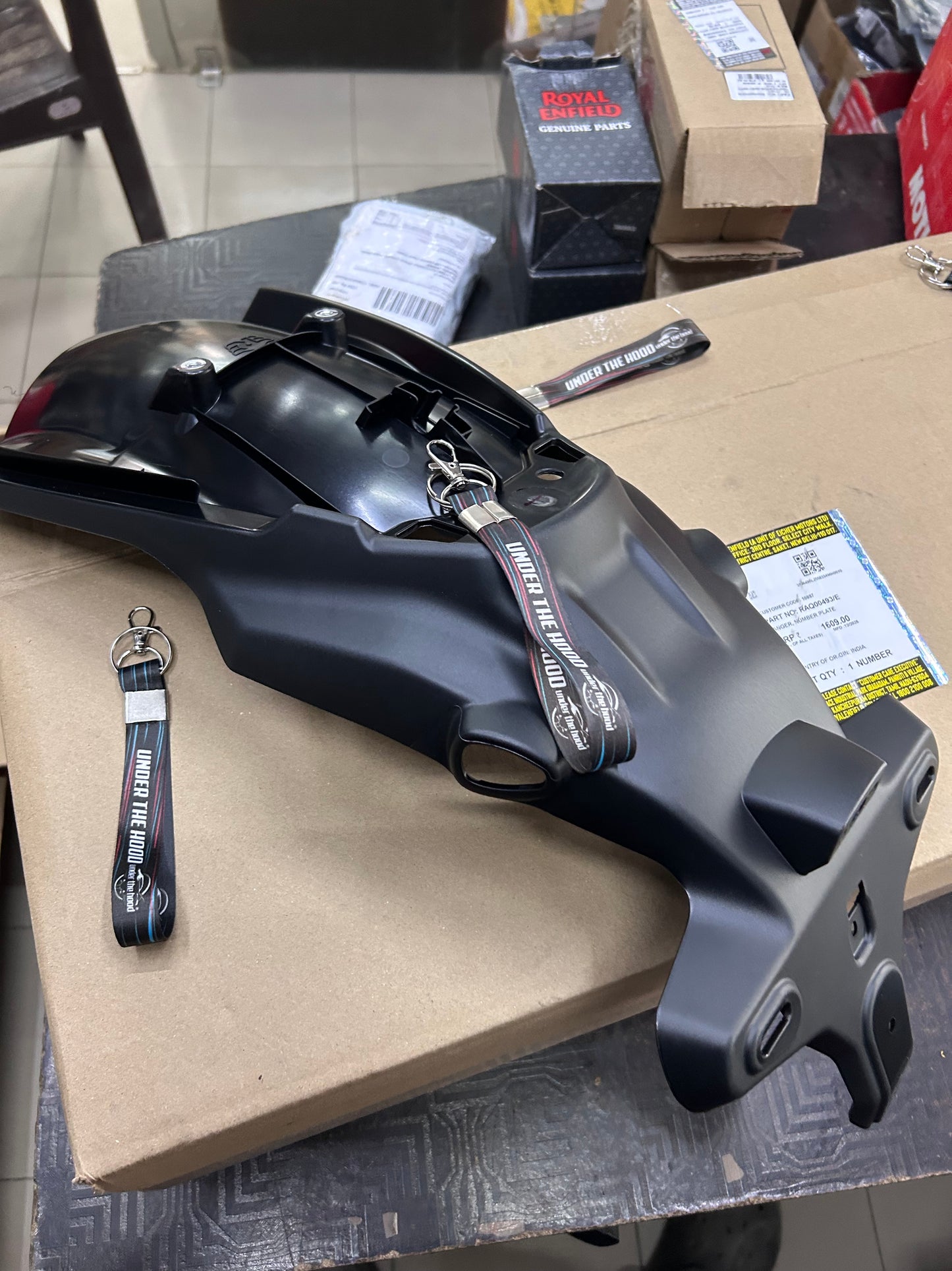RAQ00493 Royal Enfield – Hanger, Number Plate for Himalayan 450 (Rear Number Plate Bracket) | Genuine OEM