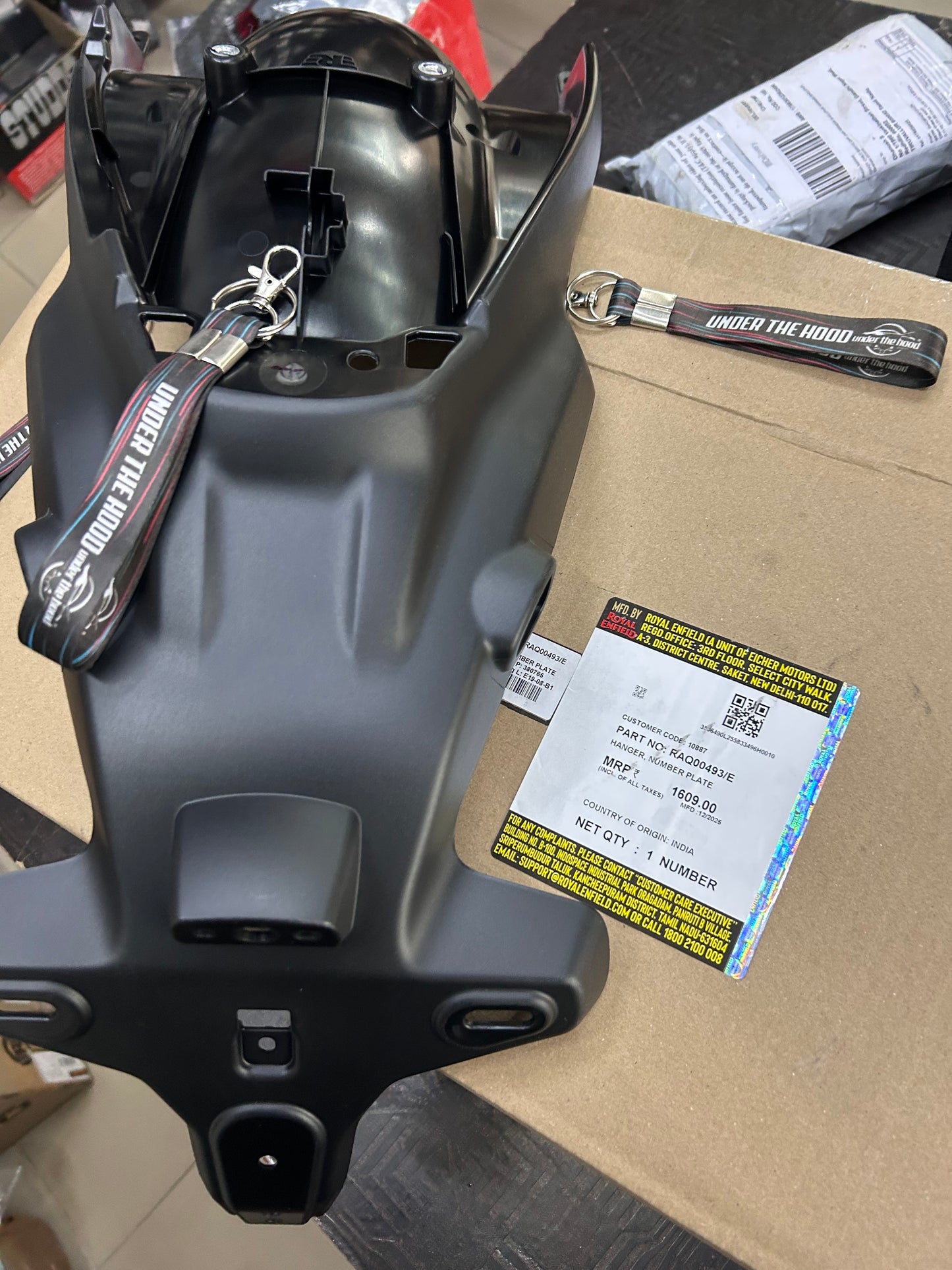 RAQ00493 Royal Enfield – Hanger, Number Plate for Himalayan 450 (Rear Number Plate Bracket) | Genuine OEM