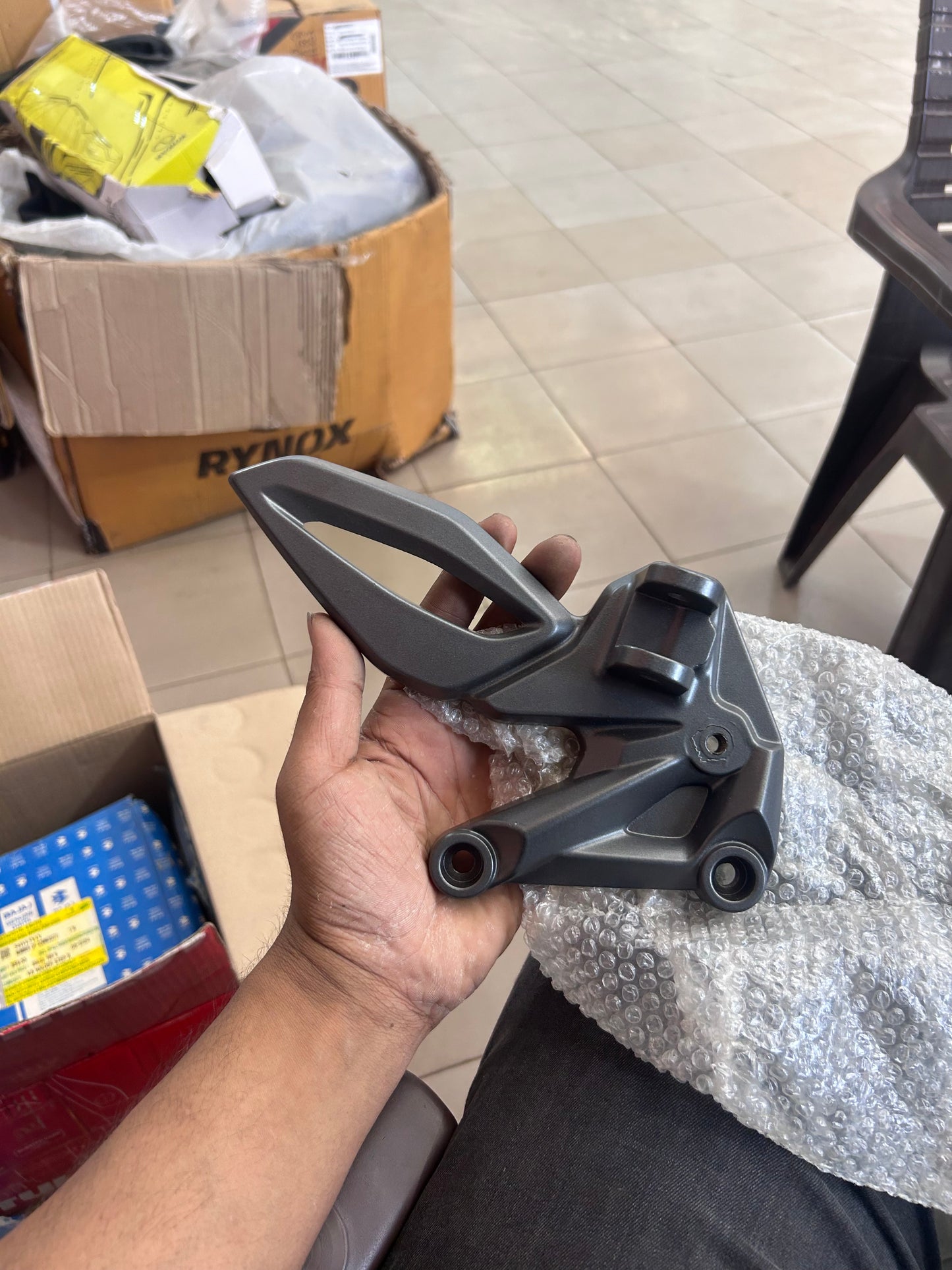 56DT3X1Y – Genuine K8 Holder Step L (Left) for Bajaj Pulsar RS200 BS4
