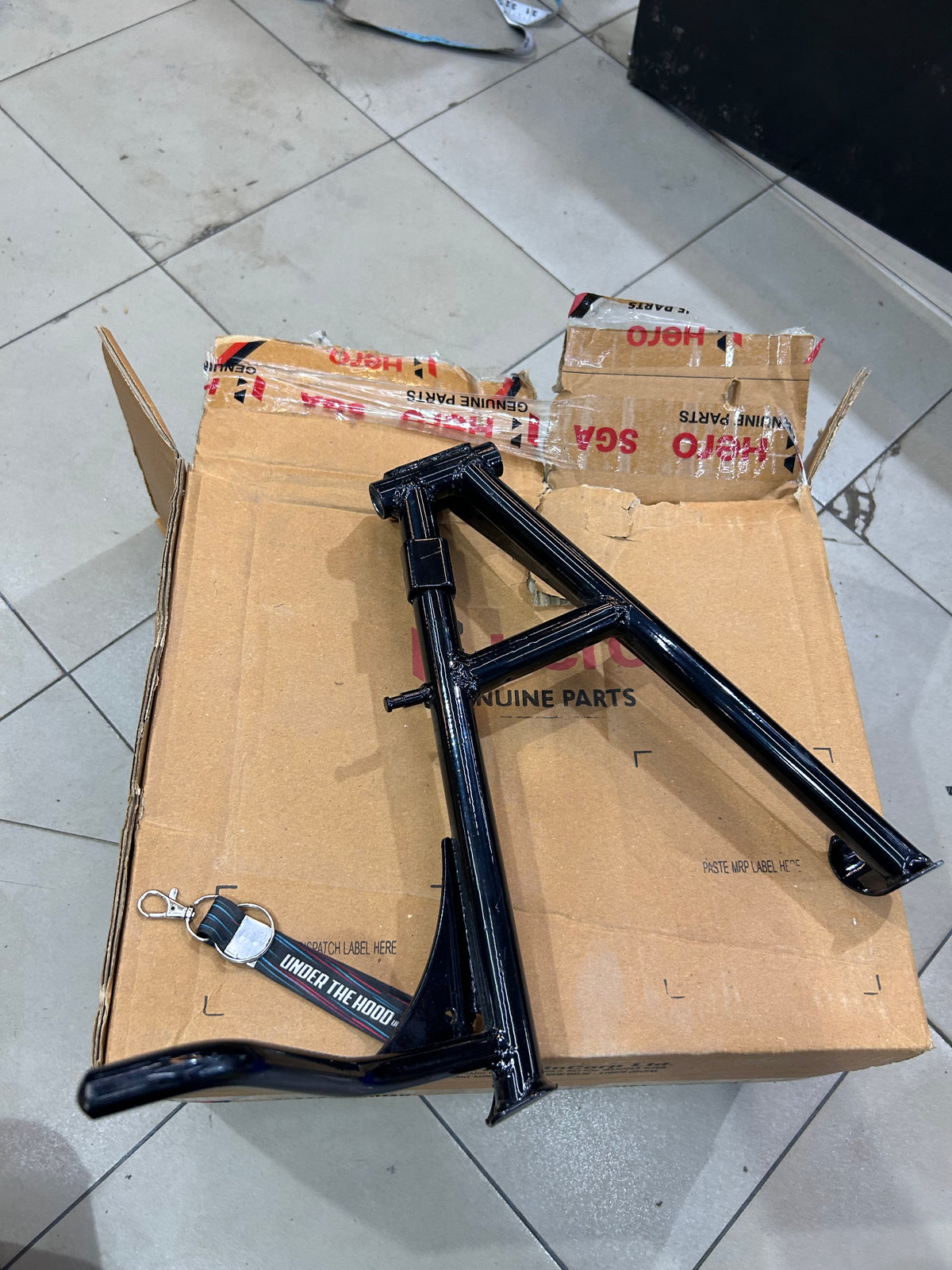 Hero Xpulse 200 Main Stand / Center Stand | Genuine Stand Comp Main | 50500ABW100S