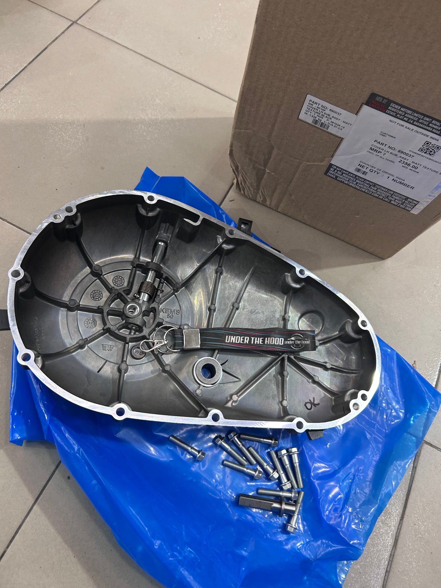 890037 – COVER LH ASSY (Left Engine Cover, Textured/Matt Black) for Thunderbird 350X (UCE) & Thunderbird 500 (UCE) – Genuine Royal Enfield