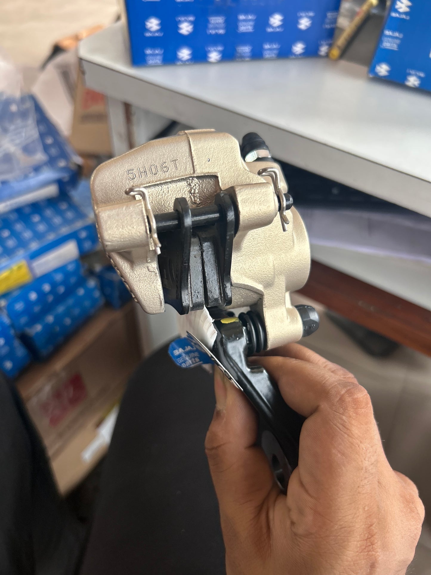 Bajaj Pulsar Rear Brake Caliper Assembly (Non-ABS) – DK151083 | OEM for 150 Twin Disc, 200NS, AS200, RS200