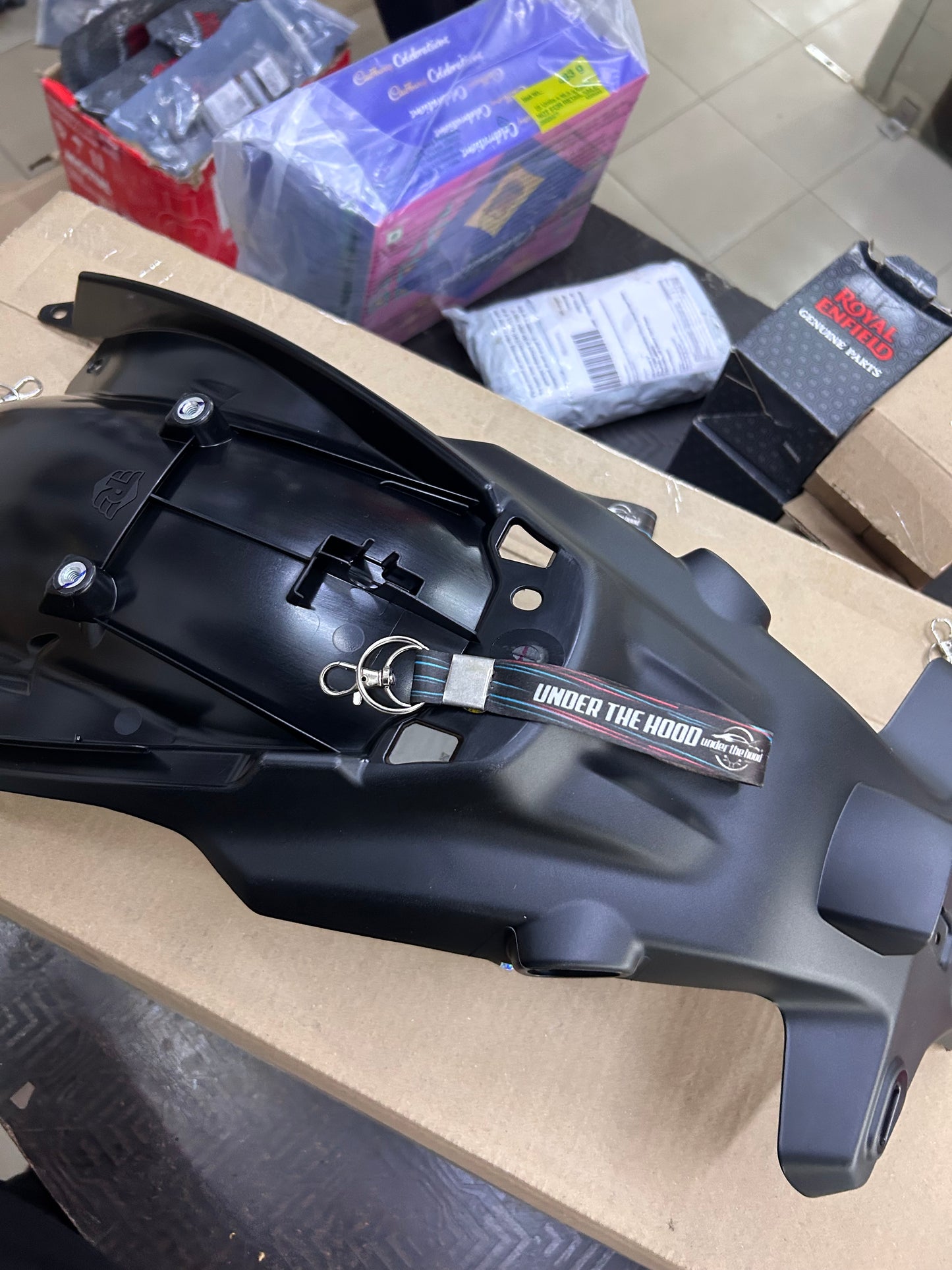 RAQ00493 Royal Enfield – Hanger, Number Plate for Himalayan 450 (Rear Number Plate Bracket) | Genuine OEM