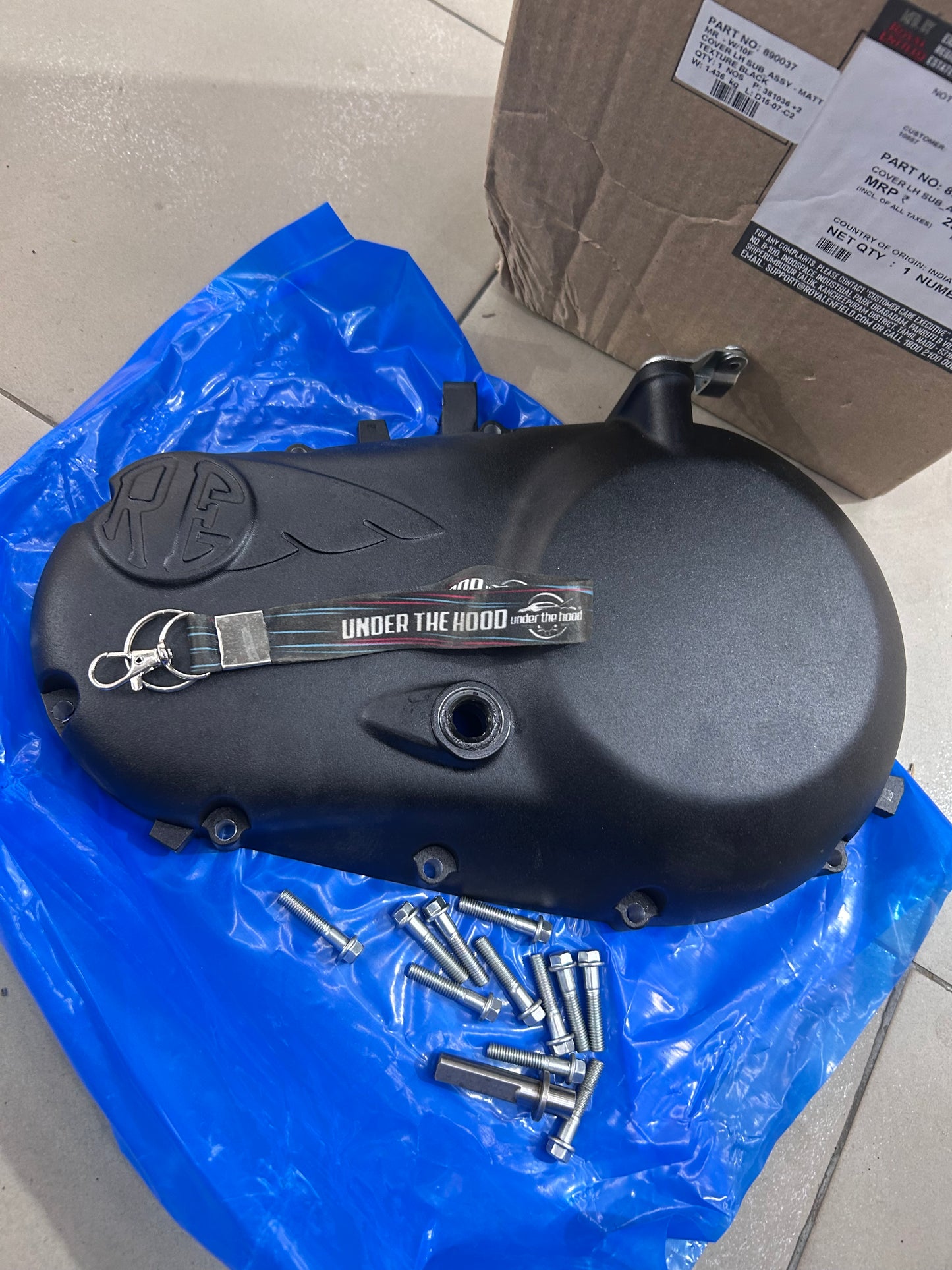 890037 – COVER LH ASSY (Left Engine Cover, Textured/Matt Black) for Thunderbird 350X (UCE) & Thunderbird 500 (UCE) – Genuine Royal Enfield