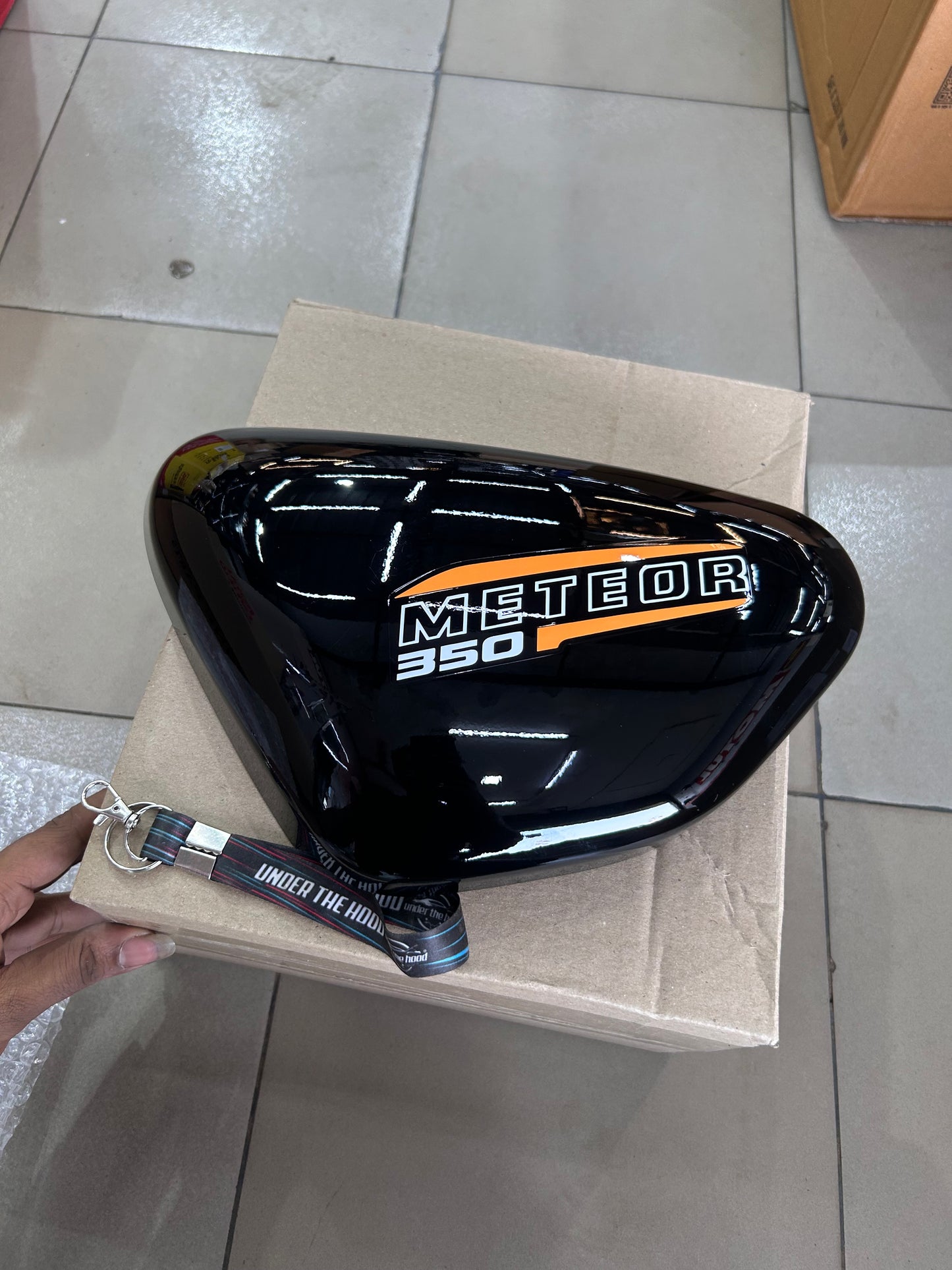 Royal Enfield Meteor 350 Fireball Orange LH Outer Cover with Orange Sticker Gloss Black RAV02804/A