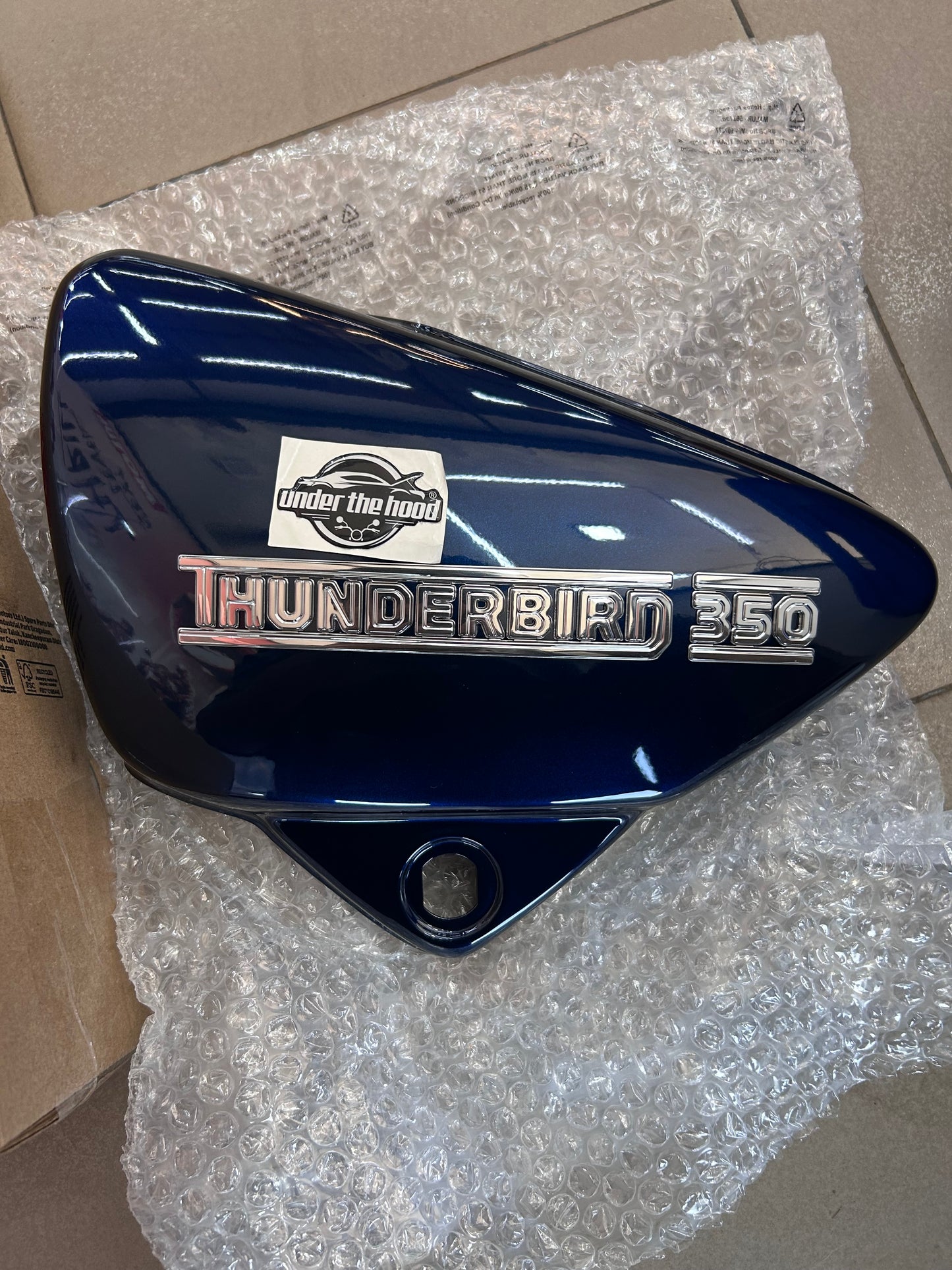 Side Panel LH with Sticker (Marine 350 VBI) for Royal Enfield Thunderbird 350 (NTB 350) – 882013