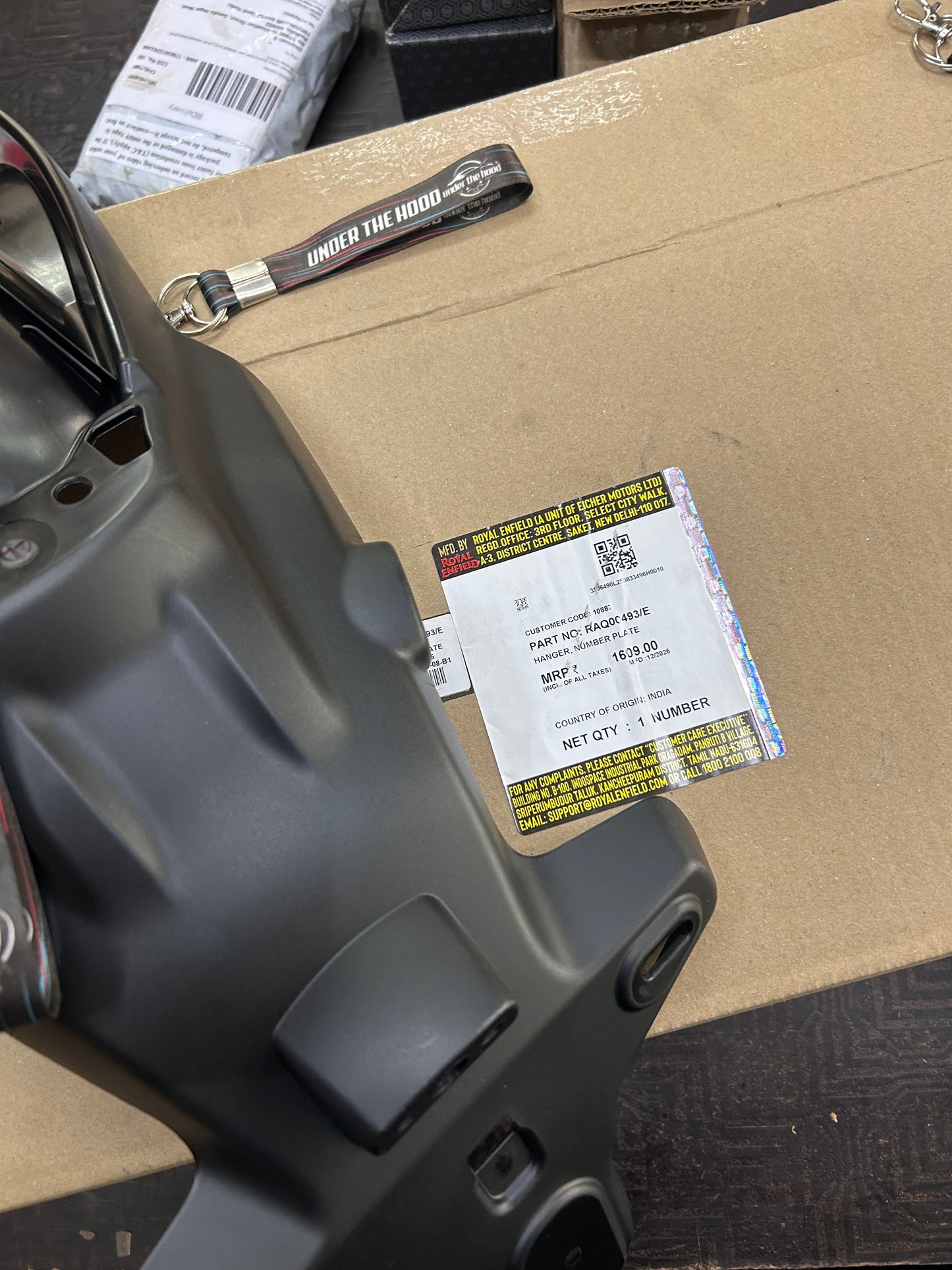 RAQ00493 Royal Enfield – Hanger, Number Plate for Himalayan 450 (Rear Number Plate Bracket) | Genuine OEM