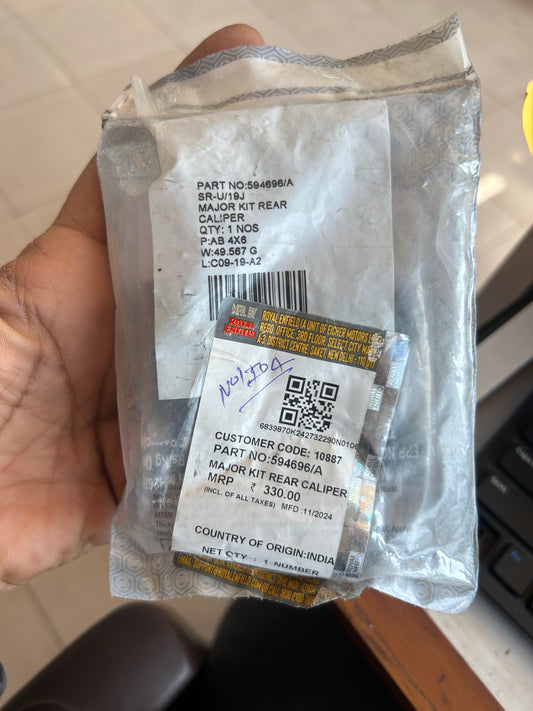 Royal Enfield 594696/A Major Kit Rear Caliper – Genuine OEM brake service kit with seals, pistons, and hardware