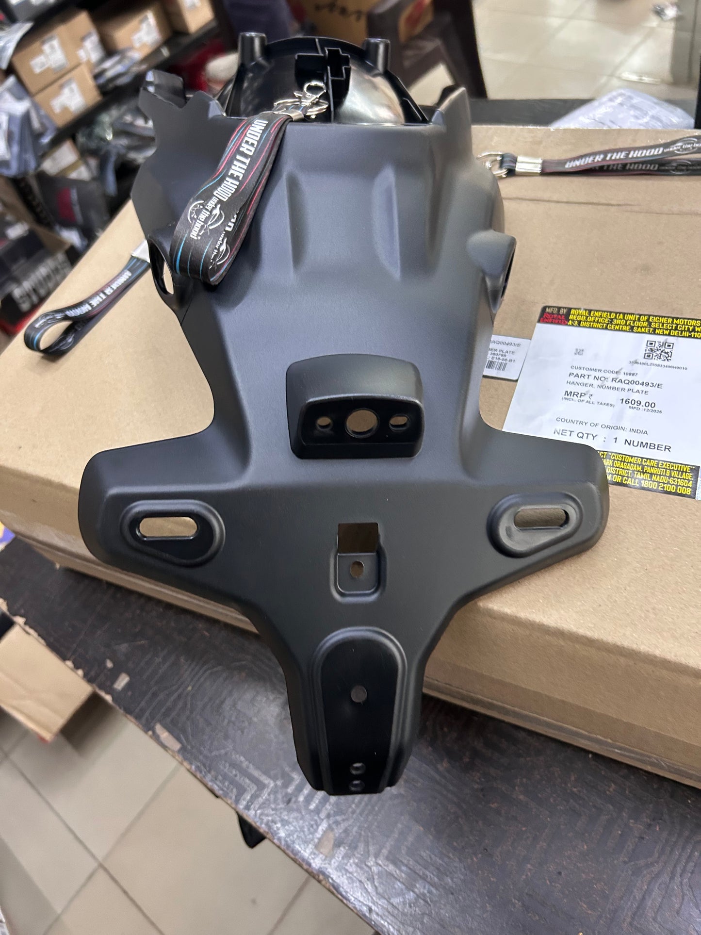 RAQ00493 Royal Enfield – Hanger, Number Plate for Himalayan 450 (Rear Number Plate Bracket) | Genuine OEM