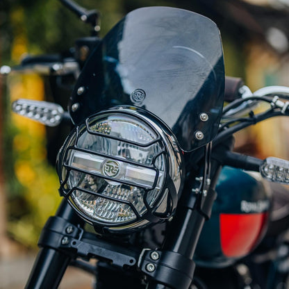 Royal Enfield Tinted Tall Flyscreen (1990542) for Bear 650. Bolt-on, tinted windscreen, stylish and functional, OEM accessory.