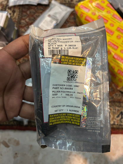 Genuine RE 890084 LH pillion footpeg matt black for Himalayan 410 Euro4.