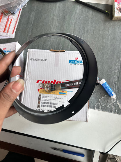 Uno Minda black headlight rim set for Classic 350 UCE: RE-143-HLR-I inner + RE-143-HLR-O outer.