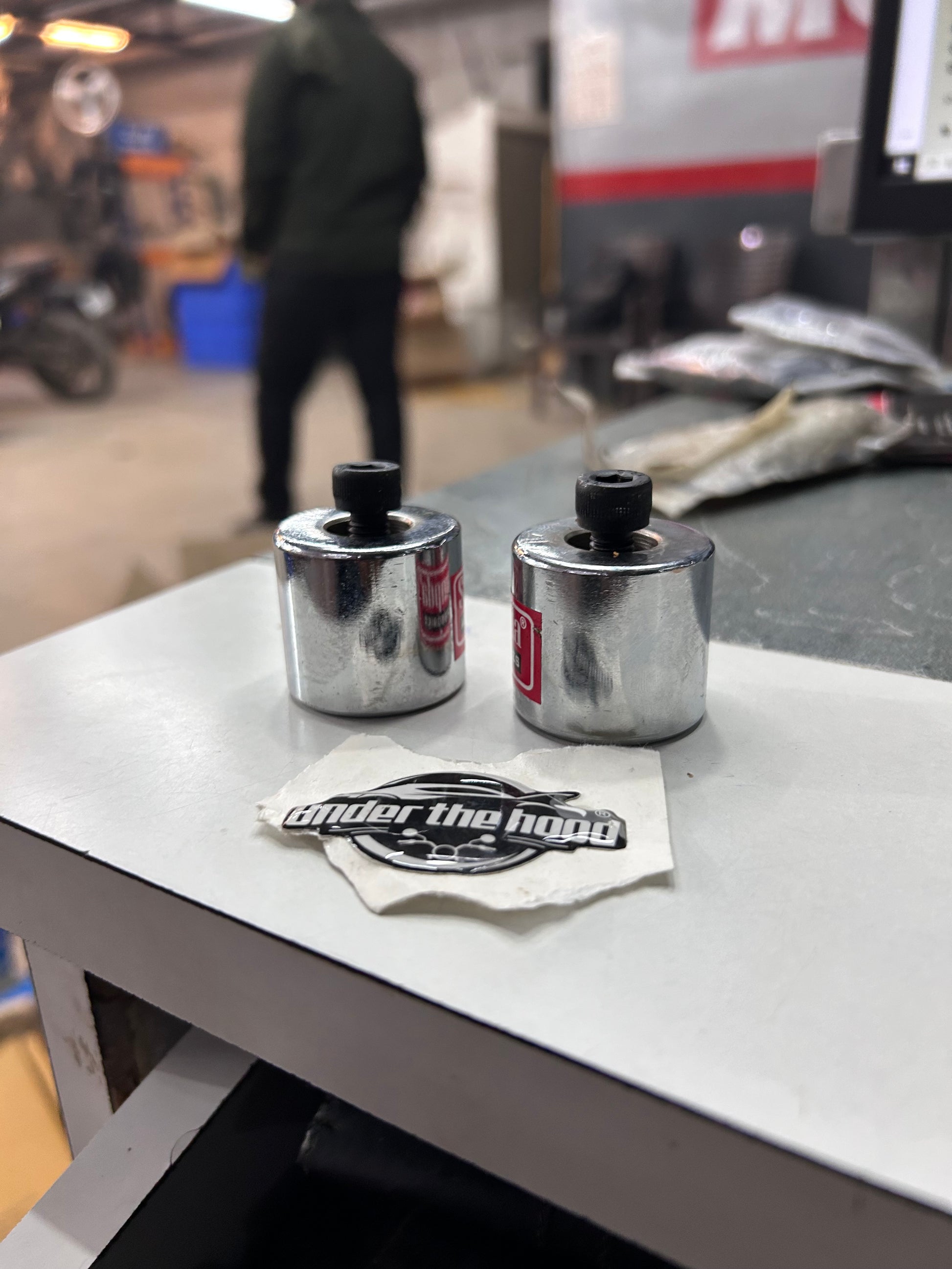Aftermarket chrome bar end weights for Royal Enfield UCE models
