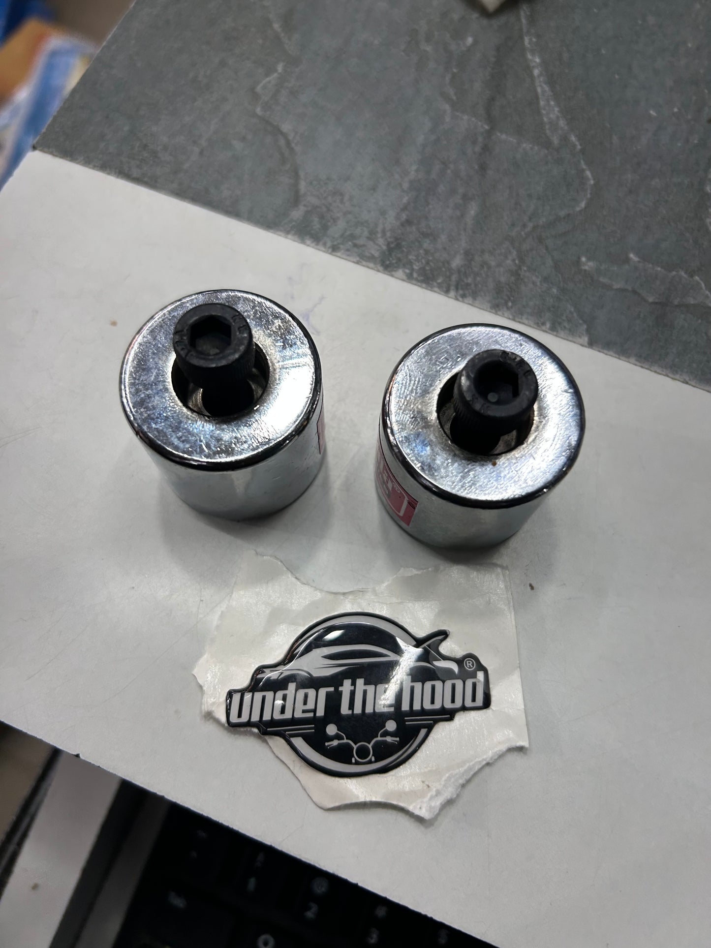 Closeup of chrome handle weights with Allen bolt mounting