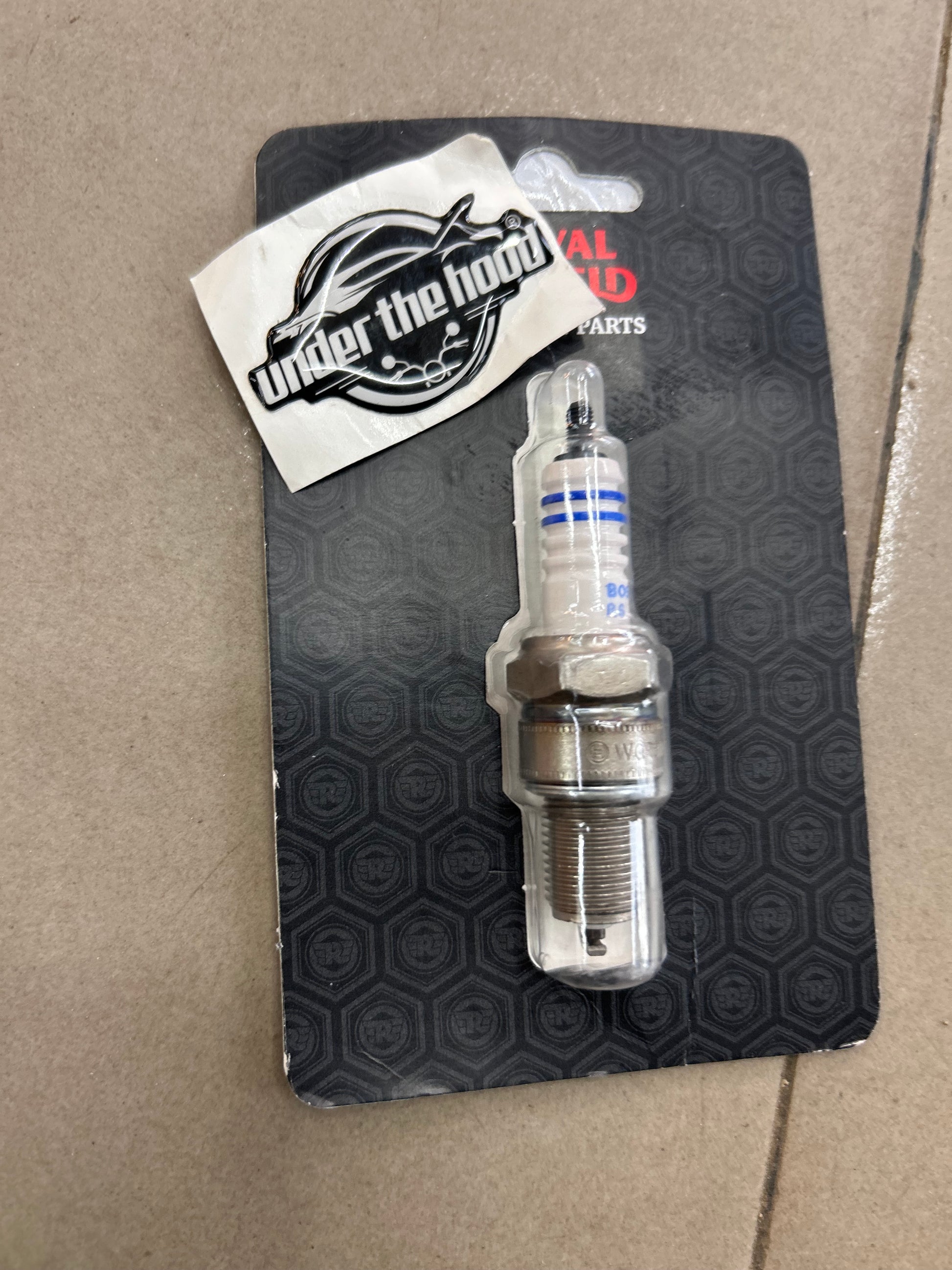 Royal Enfield OEM spark plug 572327/B WQR8DC box and electrode close-up